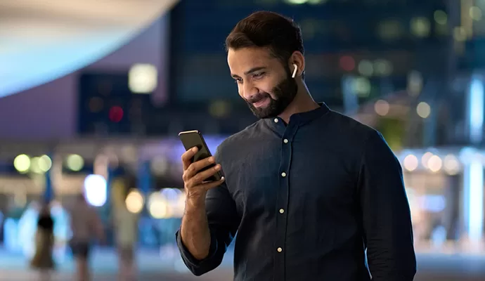 Employer checking payroll on a phone